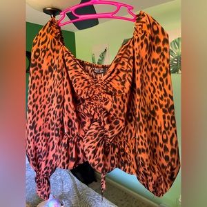 Orange and Black shirt/crop top.